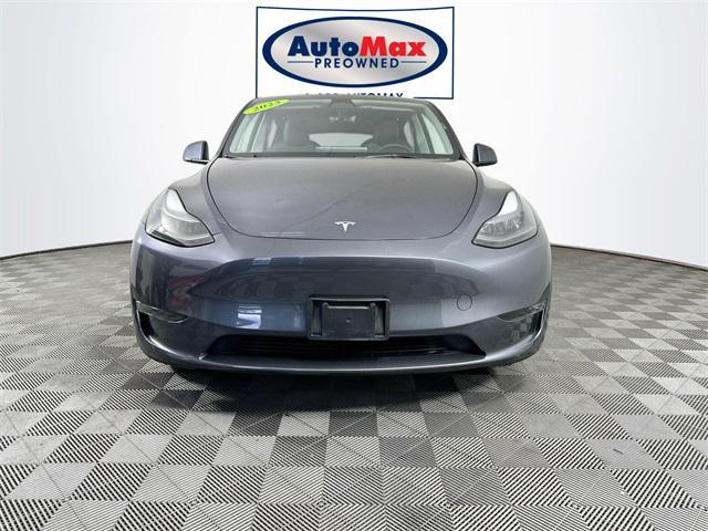 used 2023 Tesla Model Y car, priced at $31,000