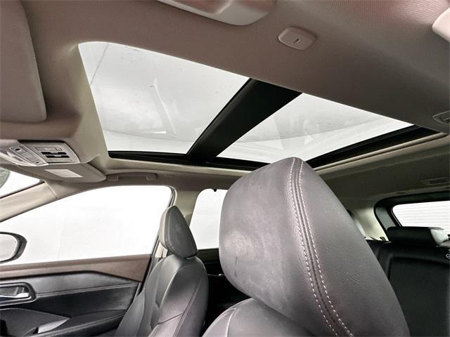 used 2022 Nissan Rogue car, priced at $30,000