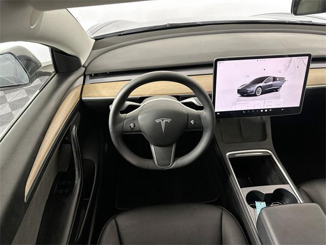used 2022 Tesla Model 3 car, priced at $28,000