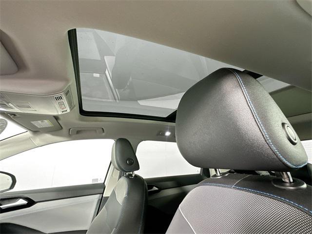 used 2024 Volkswagen Taos car, priced at $27,000