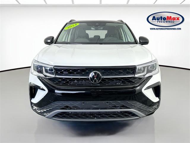 used 2024 Volkswagen Taos car, priced at $27,000