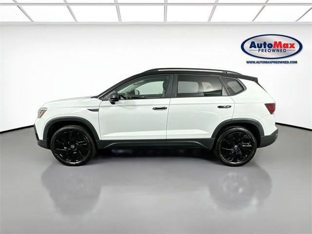 used 2024 Volkswagen Taos car, priced at $27,000