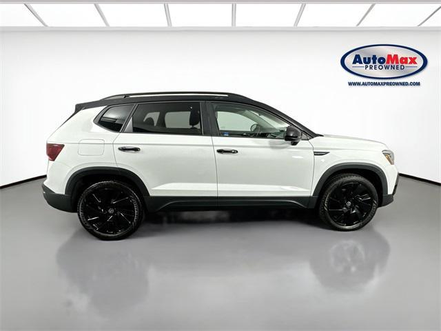 used 2024 Volkswagen Taos car, priced at $27,000
