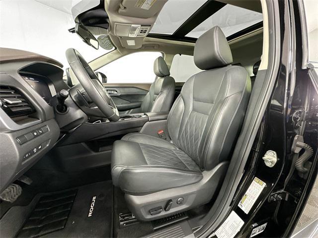 used 2023 Nissan Rogue car, priced at $30,000