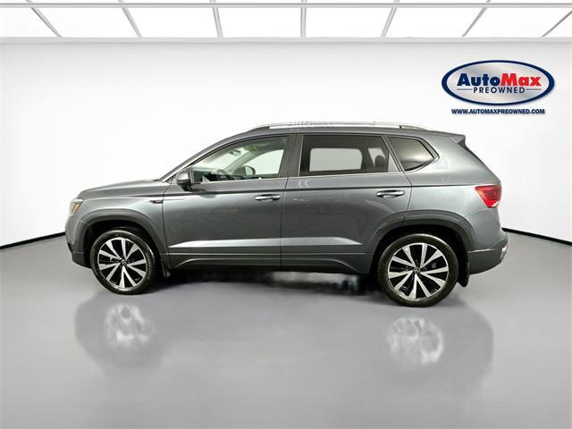 used 2023 Volkswagen Taos car, priced at $21,000