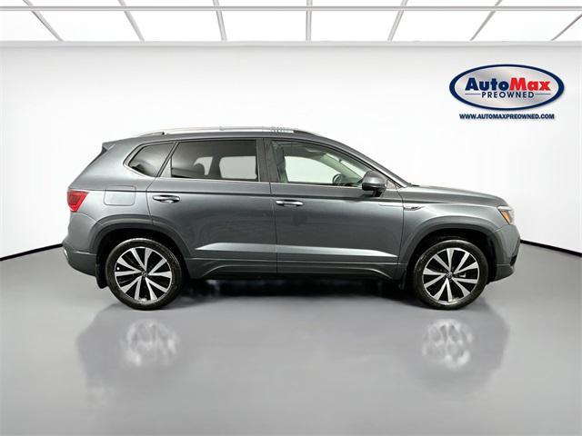 used 2023 Volkswagen Taos car, priced at $21,000