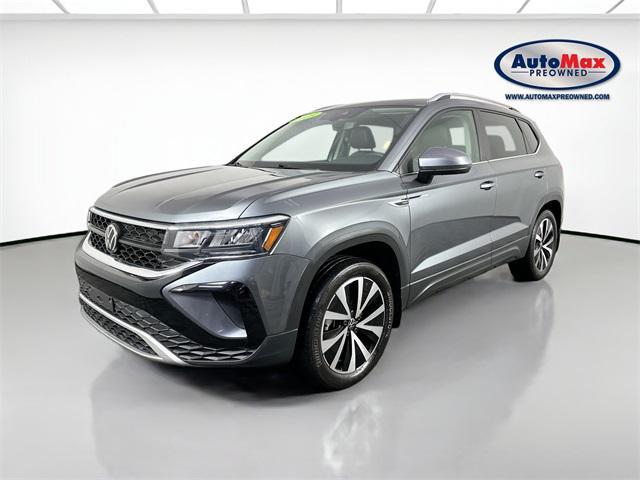 used 2023 Volkswagen Taos car, priced at $21,000