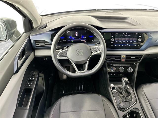 used 2023 Volkswagen Taos car, priced at $21,000