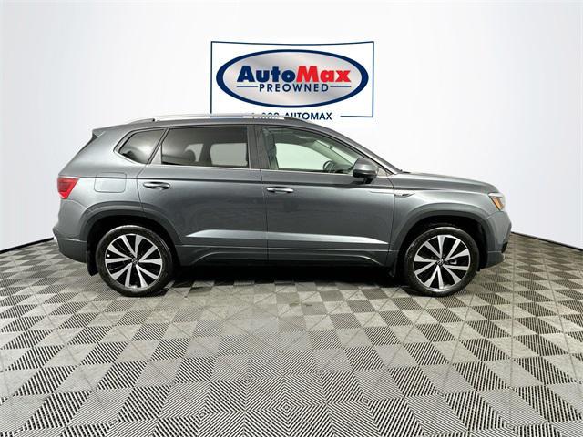 used 2023 Volkswagen Taos car, priced at $23,000