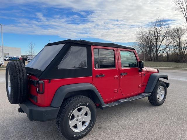 used 2013 Jeep Wrangler Unlimited car, priced at $15,377