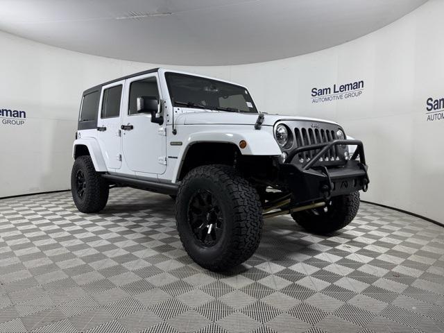 used 2016 Jeep Wrangler Unlimited car, priced at $16,991