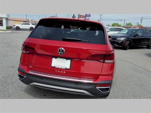 used 2023 Volkswagen Taos car, priced at $25,499