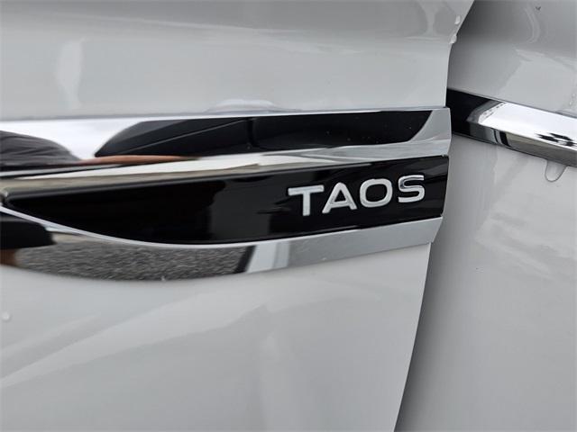 new 2024 Volkswagen Taos car, priced at $26,241