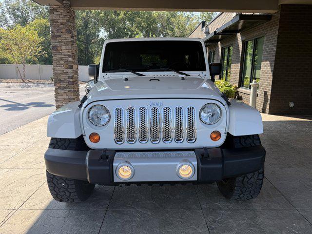 used 2010 Jeep Wrangler Unlimited car, priced at $14,995