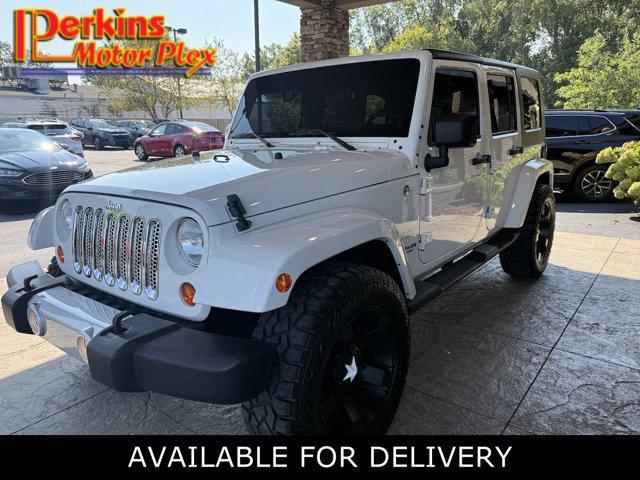 used 2010 Jeep Wrangler Unlimited car, priced at $14,995