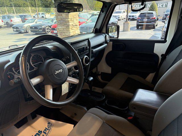used 2010 Jeep Wrangler Unlimited car, priced at $14,995