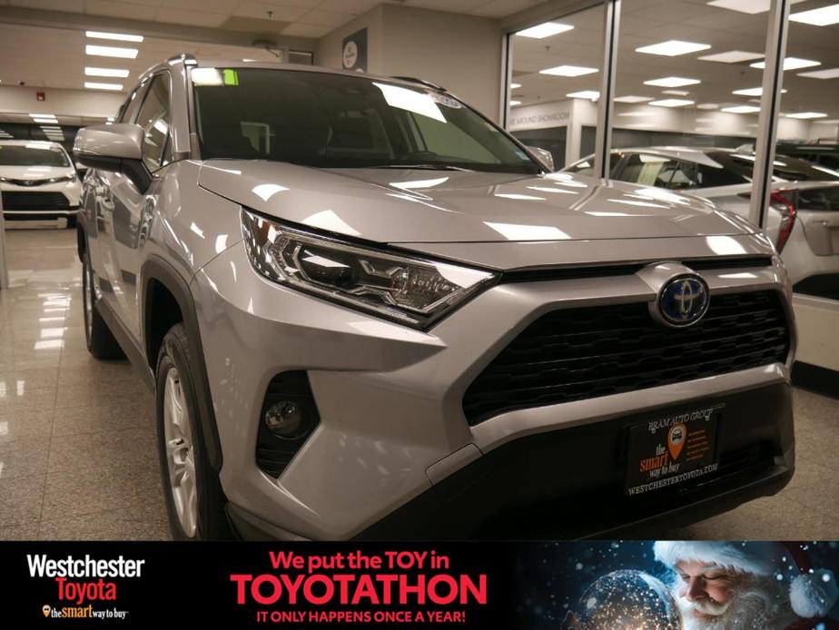 used 2021 Toyota RAV4 Hybrid car, priced at $28,588