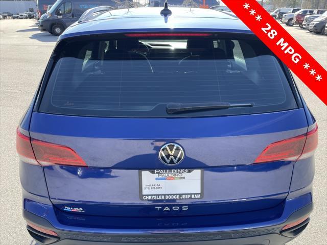 used 2023 Volkswagen Taos car, priced at $20,000