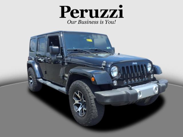 used 2015 Jeep Wrangler Unlimited car, priced at $20,695
