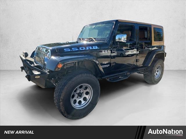 used 2012 Jeep Wrangler Unlimited car, priced at $12,991