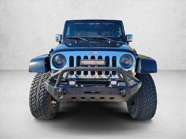 used 2012 Jeep Wrangler Unlimited car, priced at $12,991