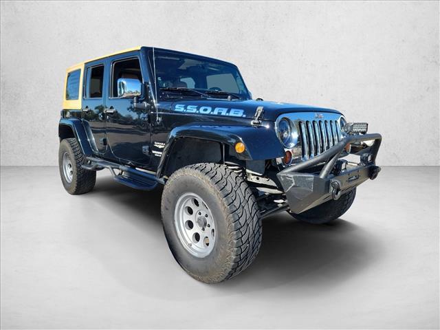 used 2012 Jeep Wrangler Unlimited car, priced at $12,991