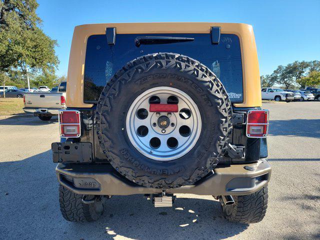 used 2012 Jeep Wrangler Unlimited car, priced at $12,991