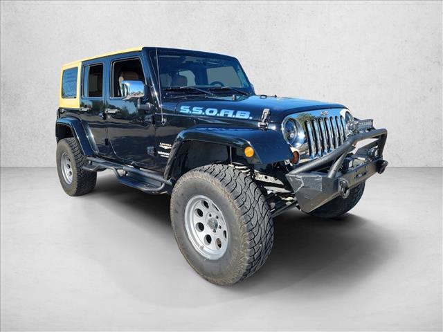 used 2012 Jeep Wrangler Unlimited car, priced at $12,991
