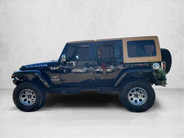 used 2012 Jeep Wrangler Unlimited car, priced at $12,991