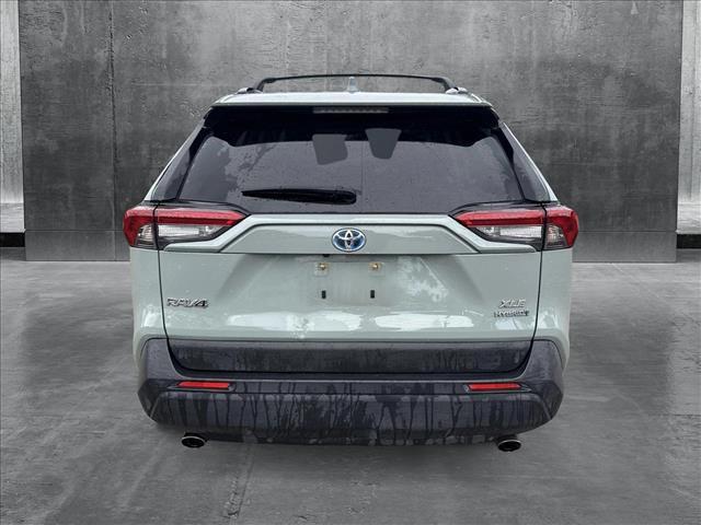 used 2021 Toyota RAV4 Hybrid car, priced at $27,495