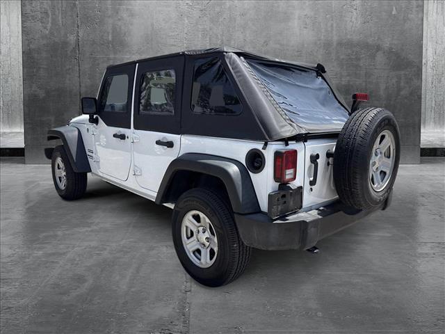 used 2016 Jeep Wrangler Unlimited car, priced at $23,991