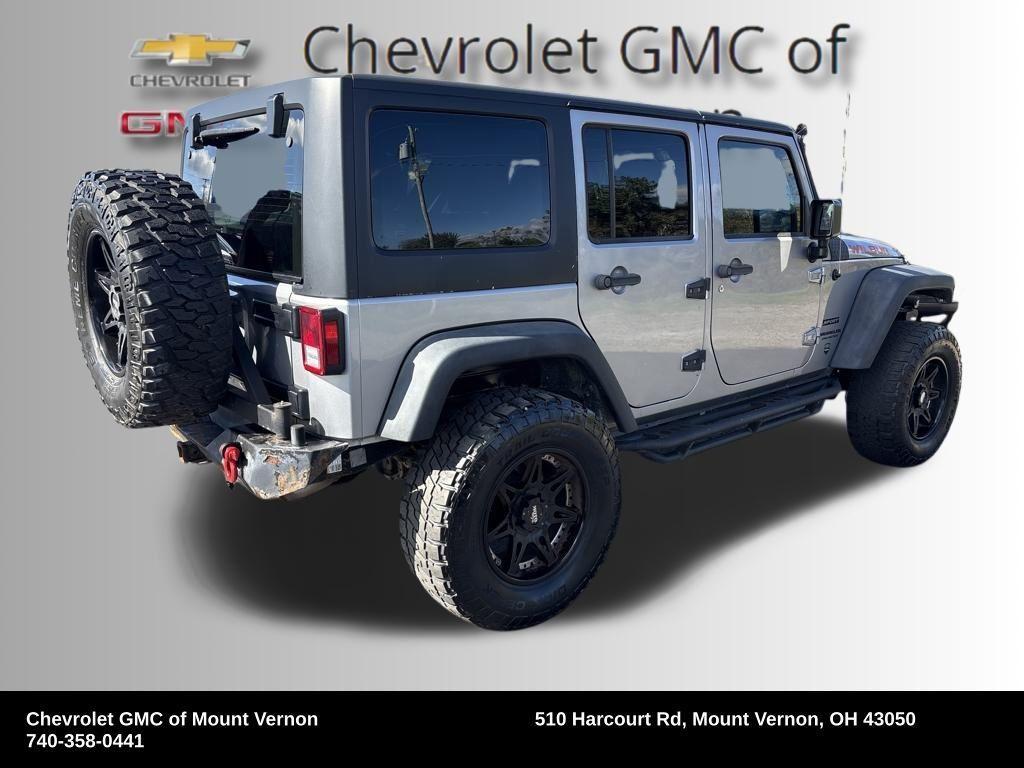 used 2015 Jeep Wrangler Unlimited car, priced at $12,455