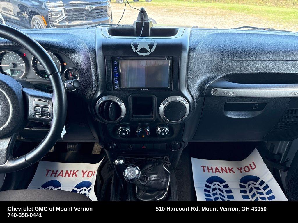 used 2015 Jeep Wrangler Unlimited car, priced at $12,455