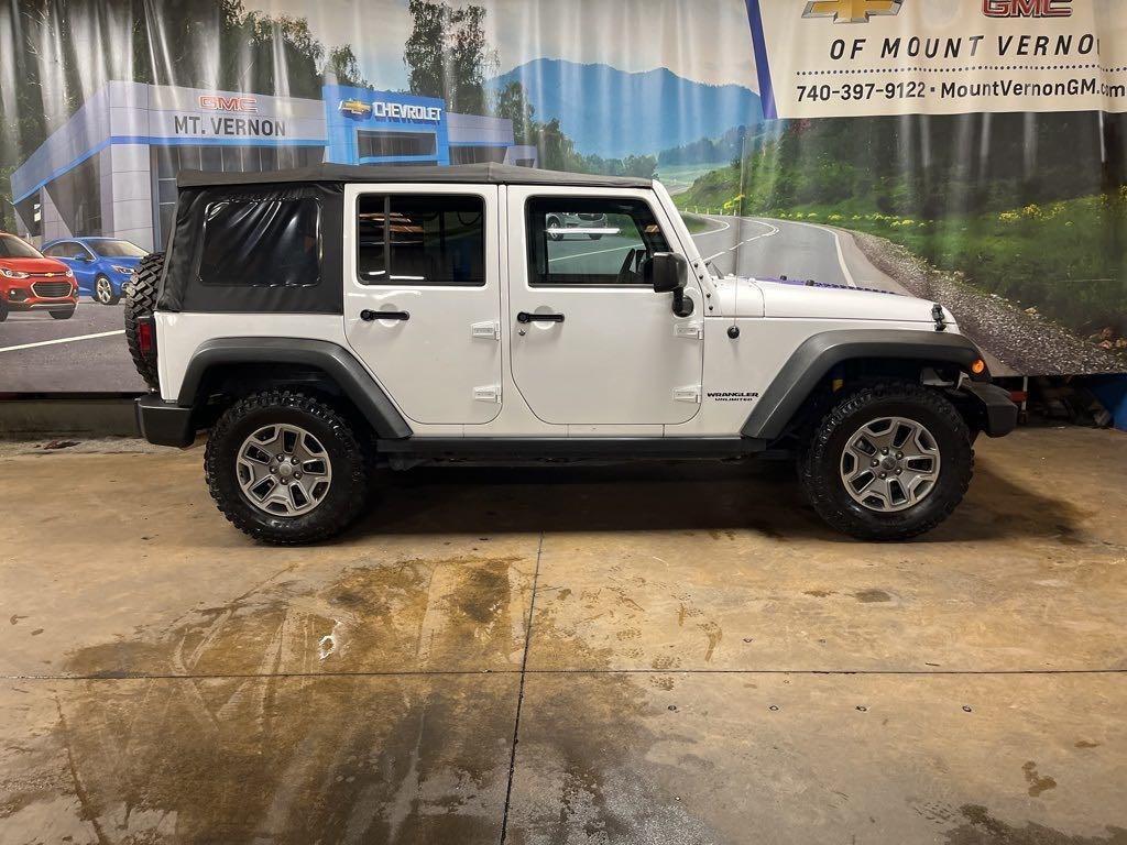 used 2015 Jeep Wrangler Unlimited car, priced at $24,396