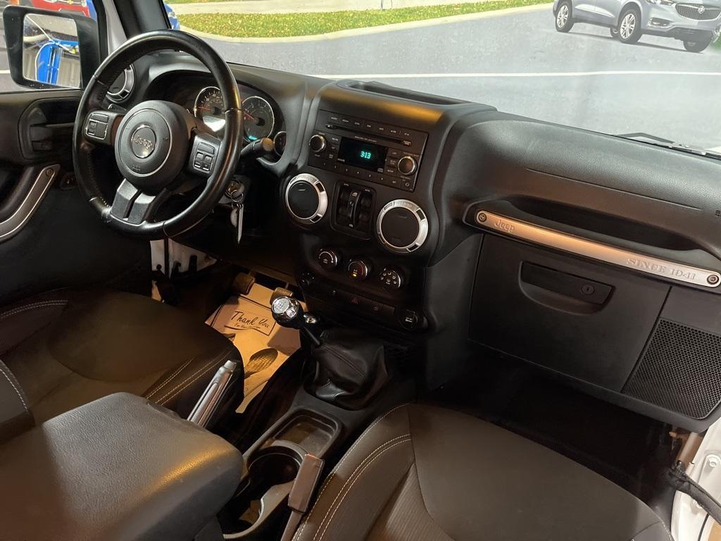 used 2015 Jeep Wrangler Unlimited car, priced at $24,396