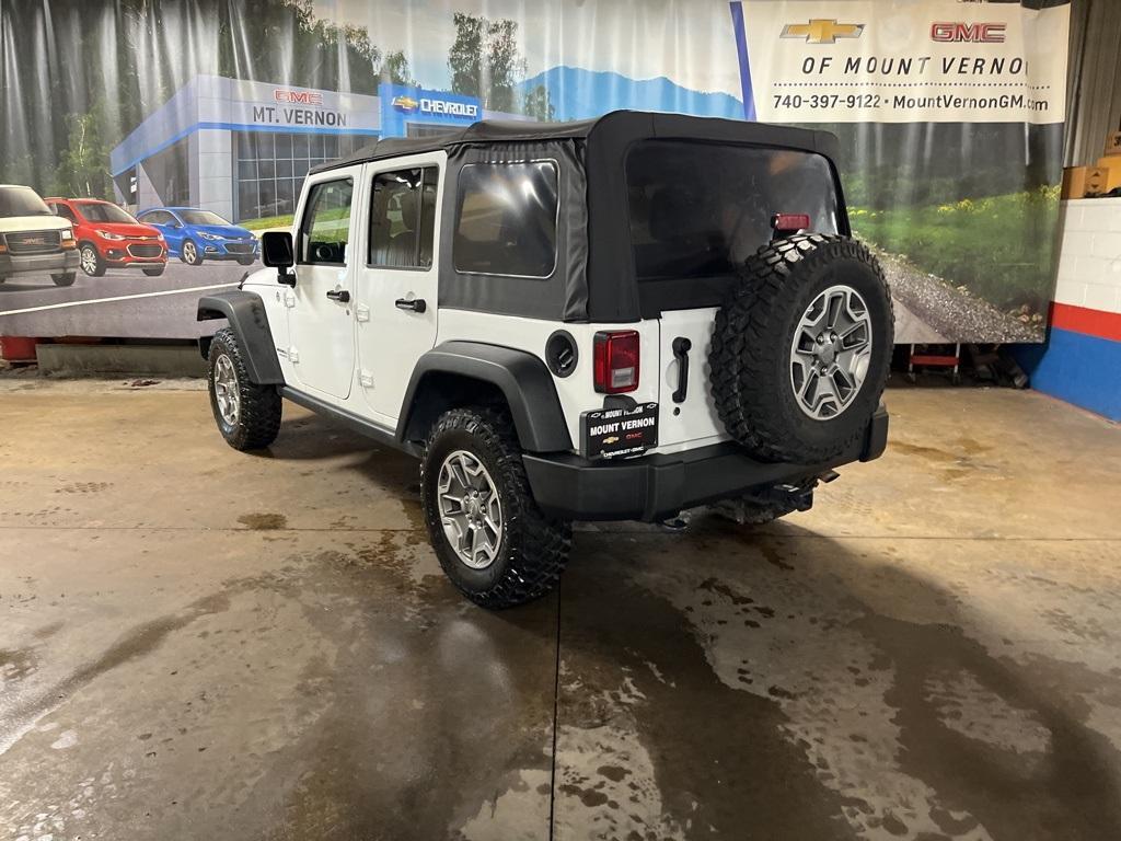 used 2015 Jeep Wrangler Unlimited car, priced at $24,396