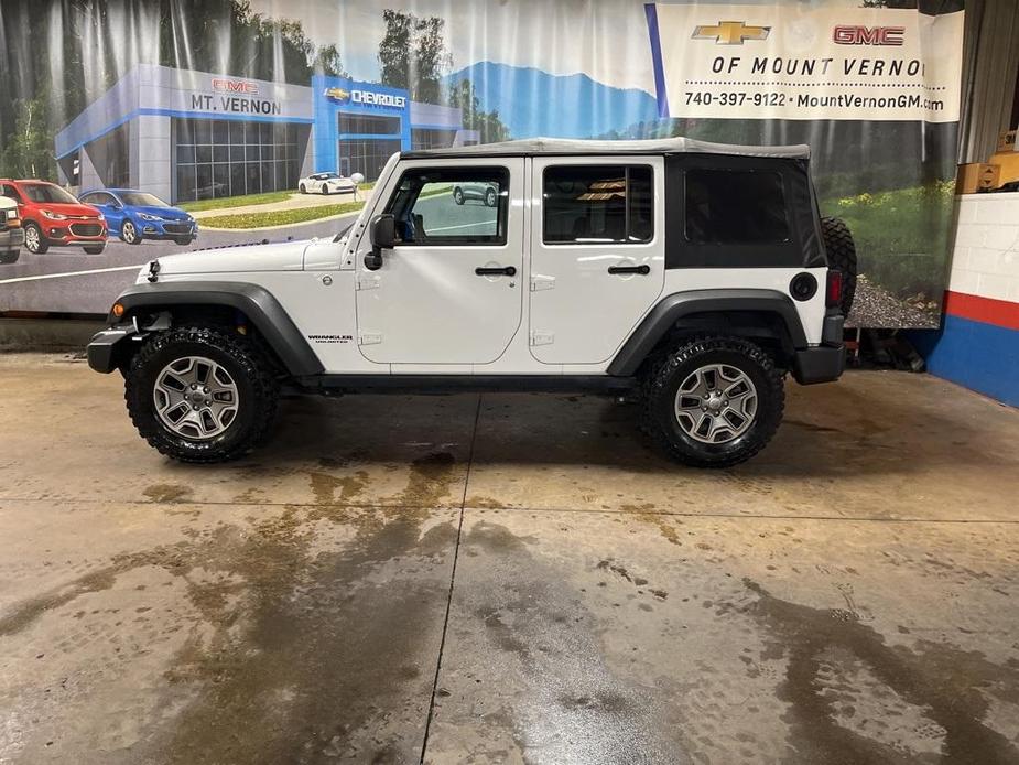 used 2015 Jeep Wrangler Unlimited car, priced at $24,396