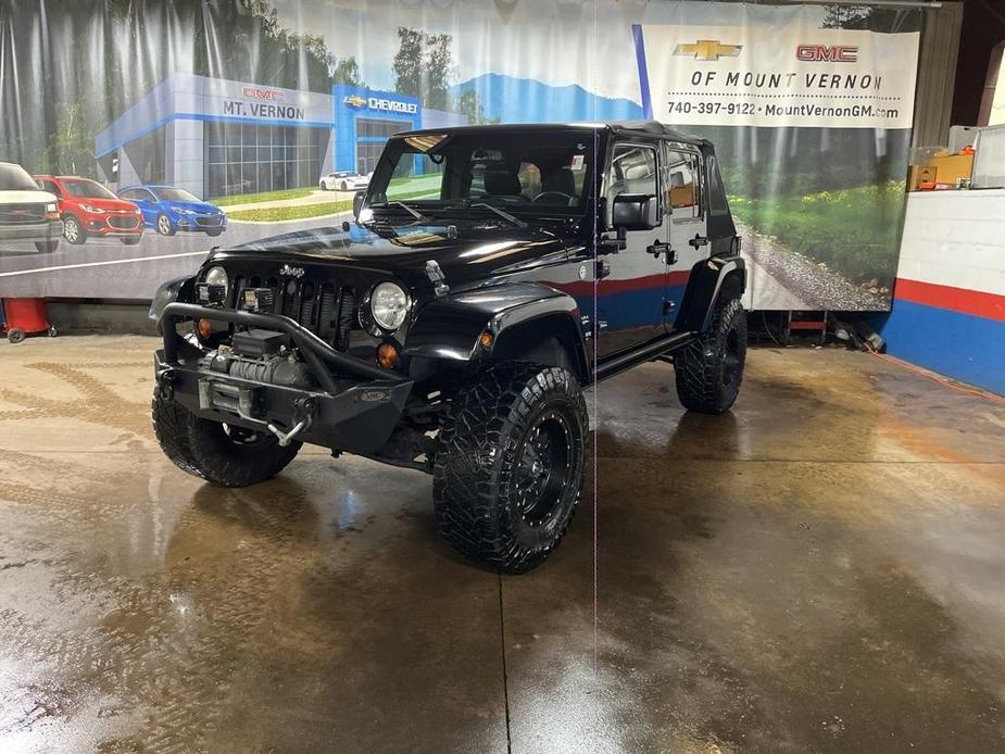 used 2013 Jeep Wrangler Unlimited car, priced at $18,419