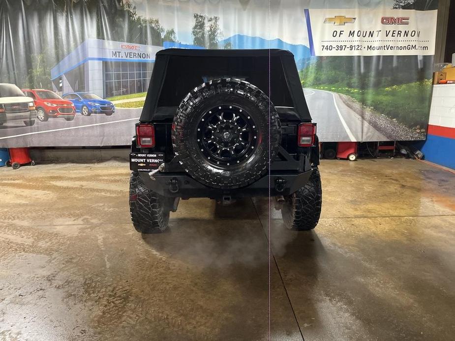 used 2013 Jeep Wrangler Unlimited car, priced at $18,419