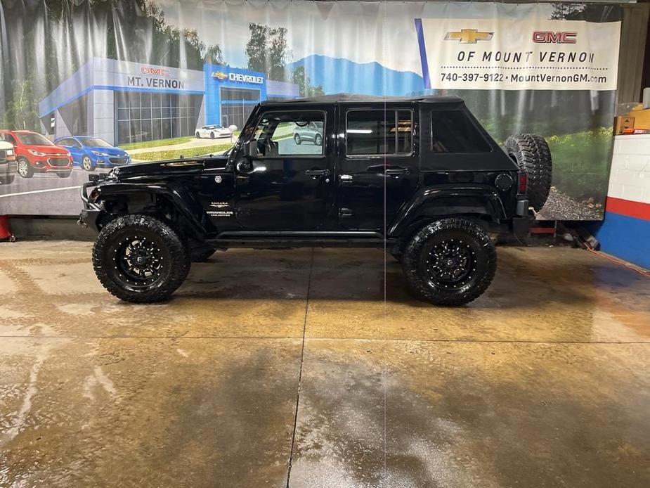 used 2013 Jeep Wrangler Unlimited car, priced at $18,419