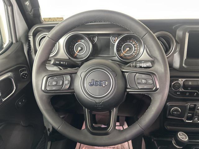 used 2023 Jeep Wrangler car, priced at $34,885