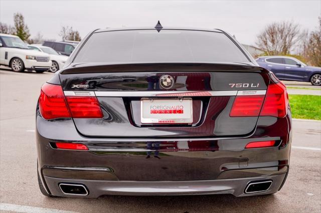 used 2014 BMW 750 car, priced at $17,999