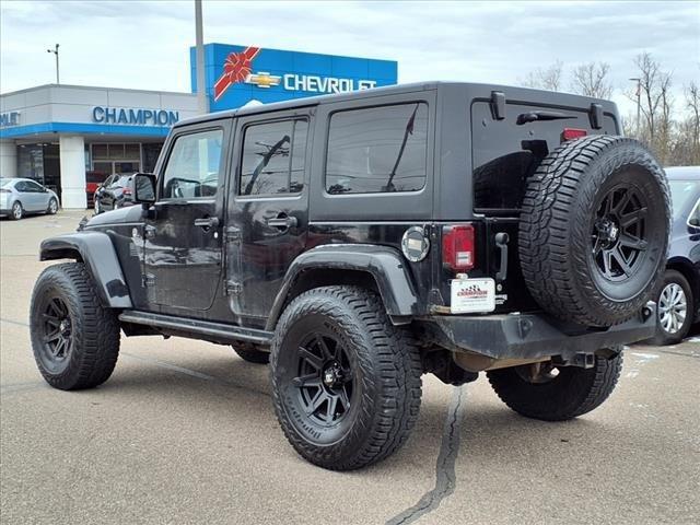 used 2013 Jeep Wrangler Unlimited car, priced at $12,250