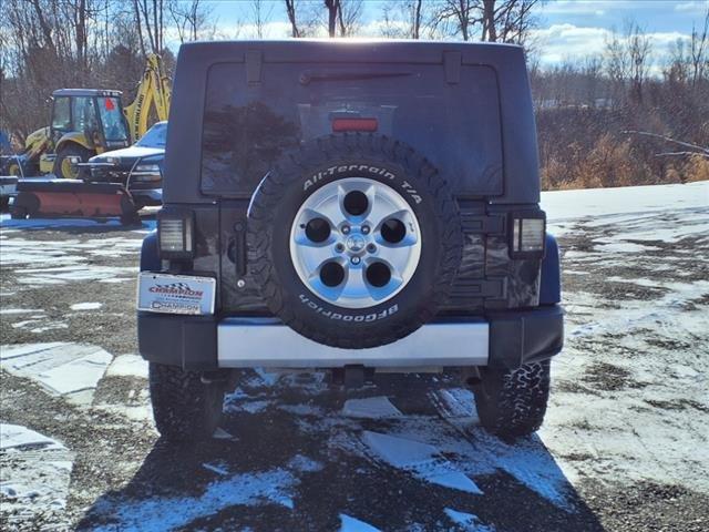 used 2015 Jeep Wrangler Unlimited car, priced at $14,750