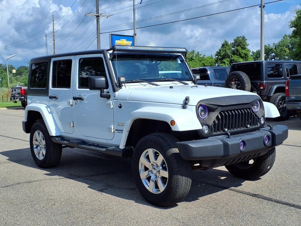 used 2015 Jeep Wrangler Unlimited car, priced at $10,950