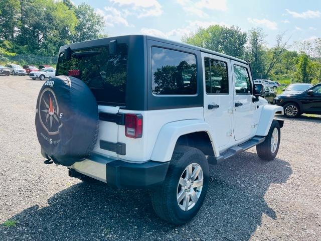 used 2015 Jeep Wrangler Unlimited car, priced at $12,250