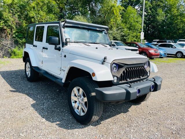 used 2015 Jeep Wrangler Unlimited car, priced at $12,250