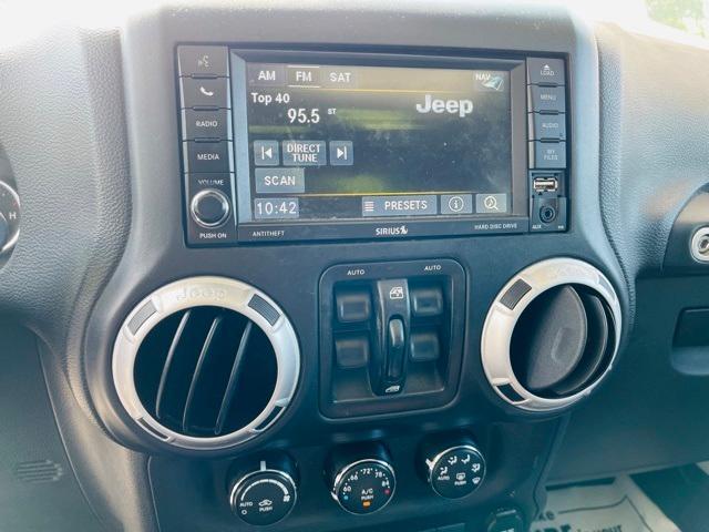 used 2015 Jeep Wrangler Unlimited car, priced at $12,250