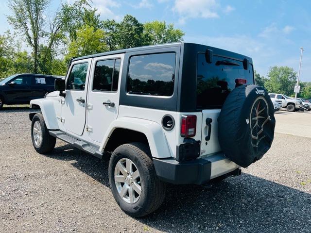 used 2015 Jeep Wrangler Unlimited car, priced at $12,250