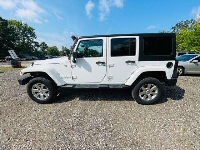 used 2015 Jeep Wrangler Unlimited car, priced at $12,250